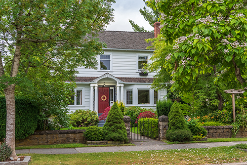 Tree removal in Smithville makes way for a healthier yard like this mature suburban home